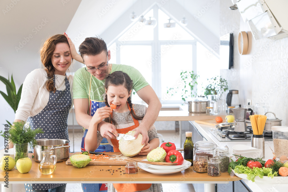Family cooking in the kitchen at home Family cooking in the kitchen at home