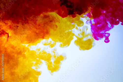 Fotografija colorful paints dissolve in water, abstract background