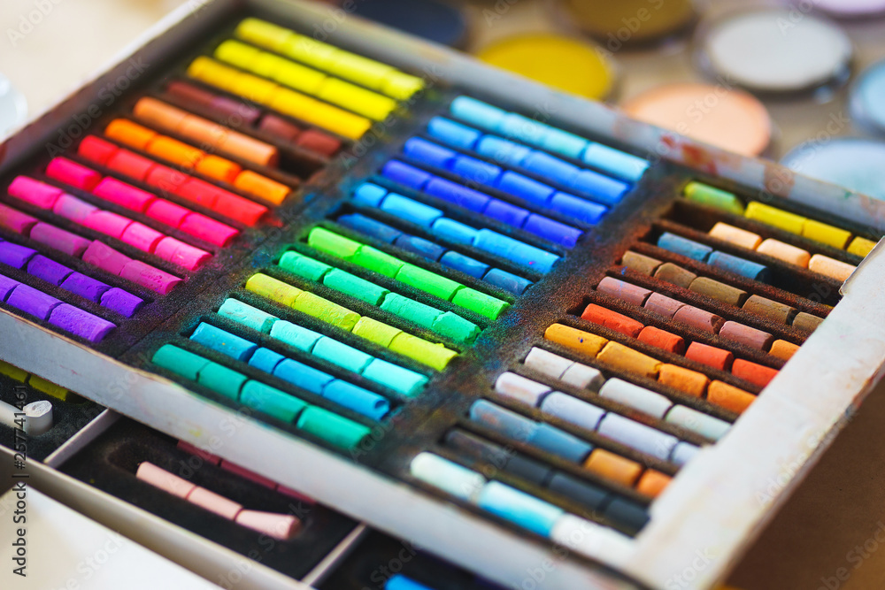 Pastel crayons paint special palette box. Accessories and tools of the artist for drawing. Pastel crayons paint special palette box. Accessories and tools of the artist for drawing.