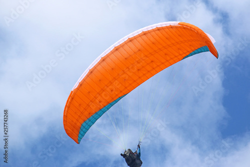 Wallpaper Mural Paraglider flying orange wing Torontodigital.ca