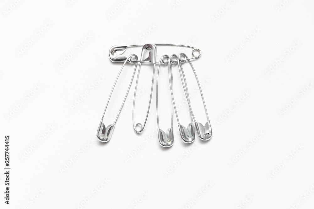 safety pin on white background, with space for text safety pin on white background, with space for text