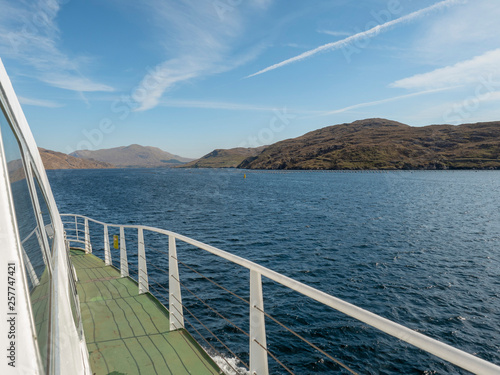Bank of Killary fjord, sunny day, view from a ship.County Galway, Ireland.