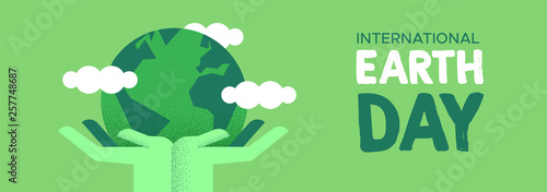 Earth Day banner of hands holding green planet