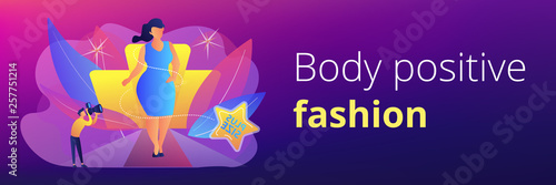 Photographer taking photos of plus size model in runway fashion show. Plus size models, body positive fashion, plus-size clothing modeling concept. Header or footer banner template with copy space.
