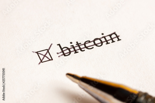 Checked checkbox with word bitcoin at wait background. questionnaire concept.