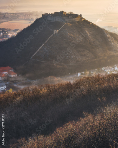 Ruin of the Castle on the Hill at Sunrise. Schlossberg Castle in Hainburg an der Donau, Austria at Sunrise as Seen from Hundsheimer Hill.