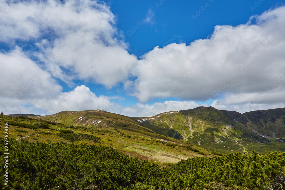 Summer landscape in mountains and the dark blue sky Summer landscape in mountains and the dark blue sky