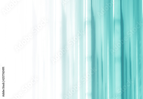 Elegant striped turquoise background pattern fading into white space