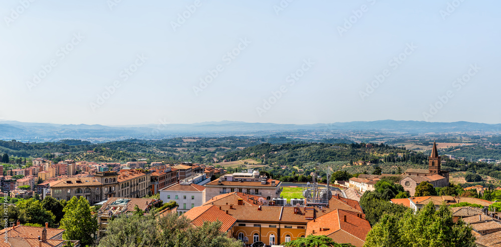 Obraz premium Perugia panorama in Umbria, Italy cityscape skyline view of church tower and rooftops of town village in summer landscape