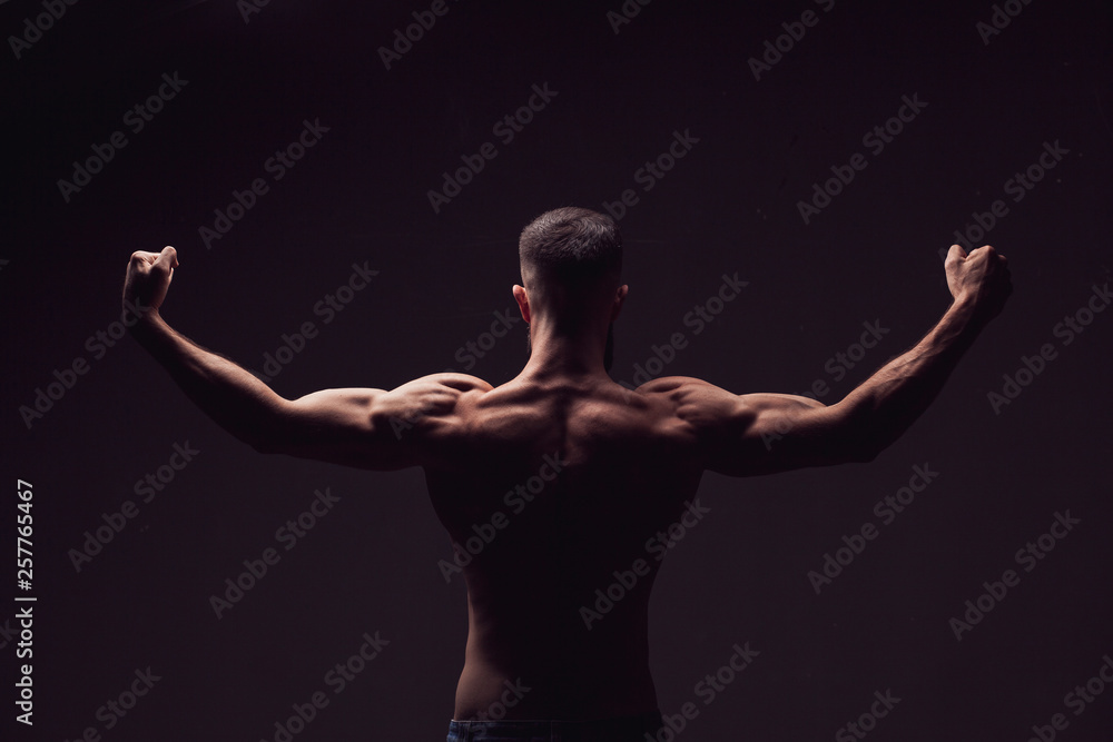 Fototapeta premium man from back on black background