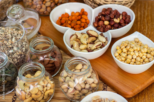 Various piles of mixed nuts and seeds