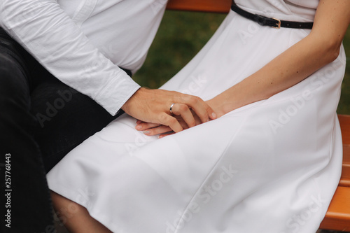 Close up view of couples hands with rings