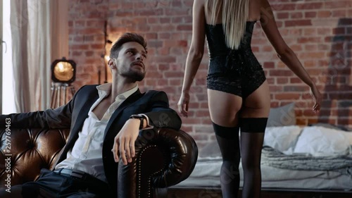 Sensual couple in a stylish, modern apartment