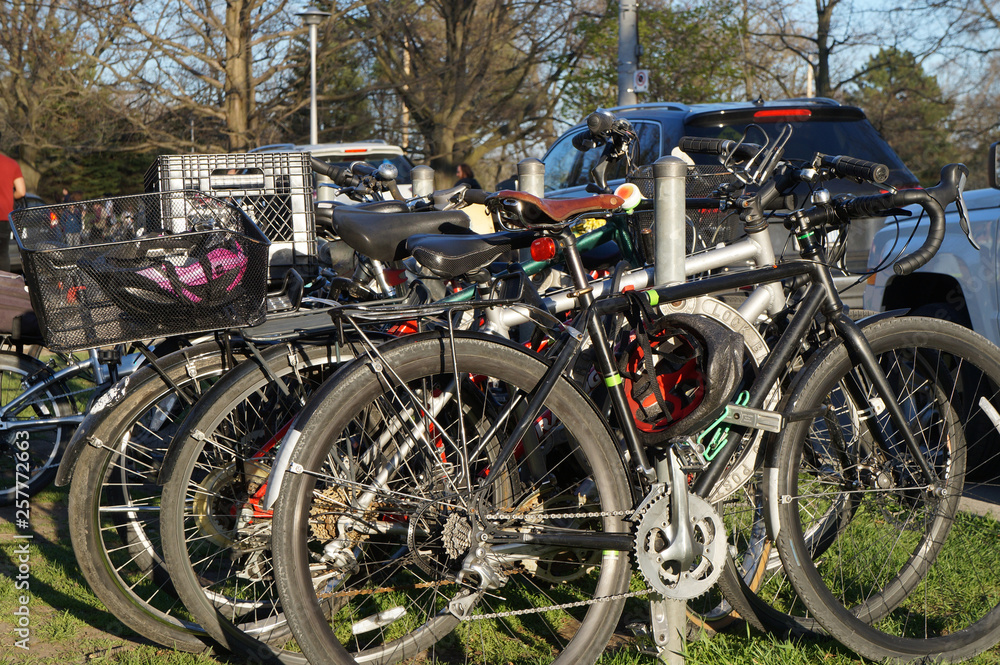 Piles of bicycles in a bicycle stall in a park