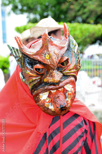 Close uo of a devill dancer in the corpus christi celebration in Los Santos, Panama photo