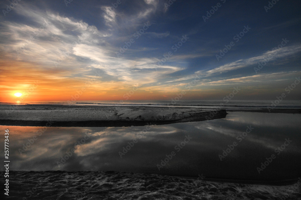 Beautiful and colorful sunset on a tropical beach at the Pacific Ocean in Panama