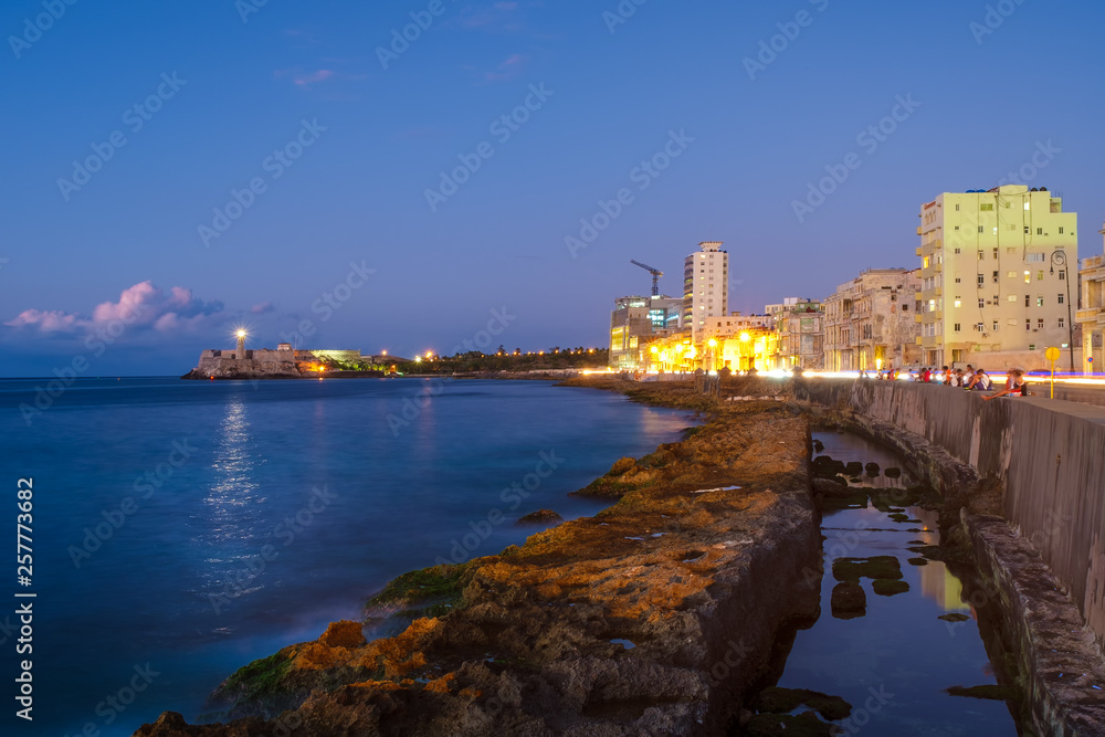 The Havana skyline, the sea and El Morro castle at sunset