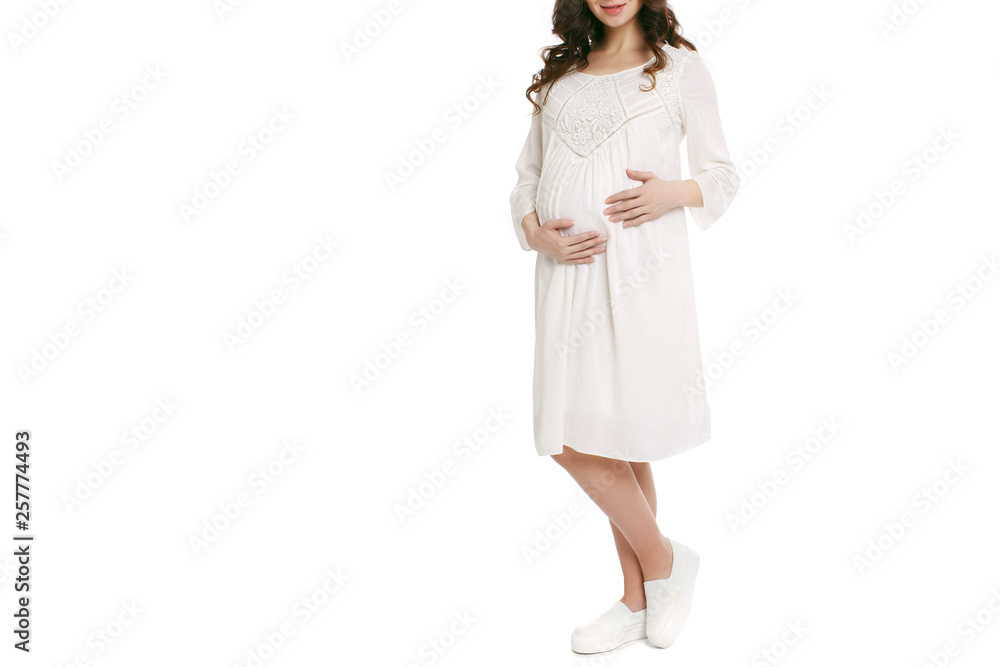 Pregnant woman in short dress isolated white background Pregnant woman in short dress isolated white background