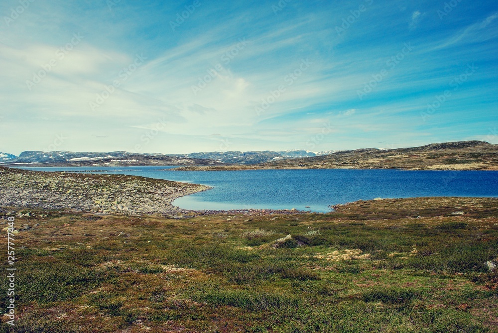 Flat terrain and blue lake in Roof of Norway, Sognefjellet Flat terrain and blue lake in Roof of Norway, Sognefjellet