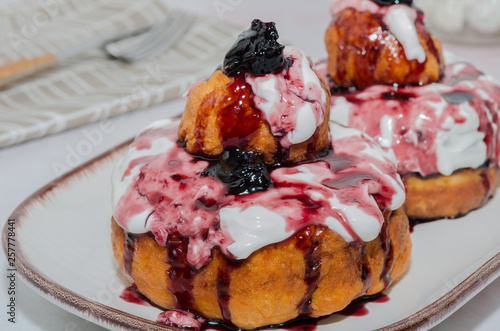 Papanasi - romanian specialty. Papanasi - a traditional romanian dessert  photo