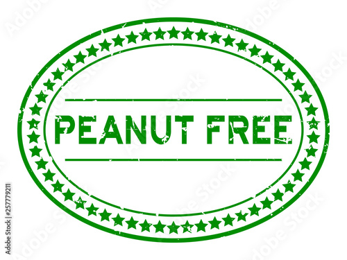 Grunge green peanut free word oval rubber seal stamp on white background