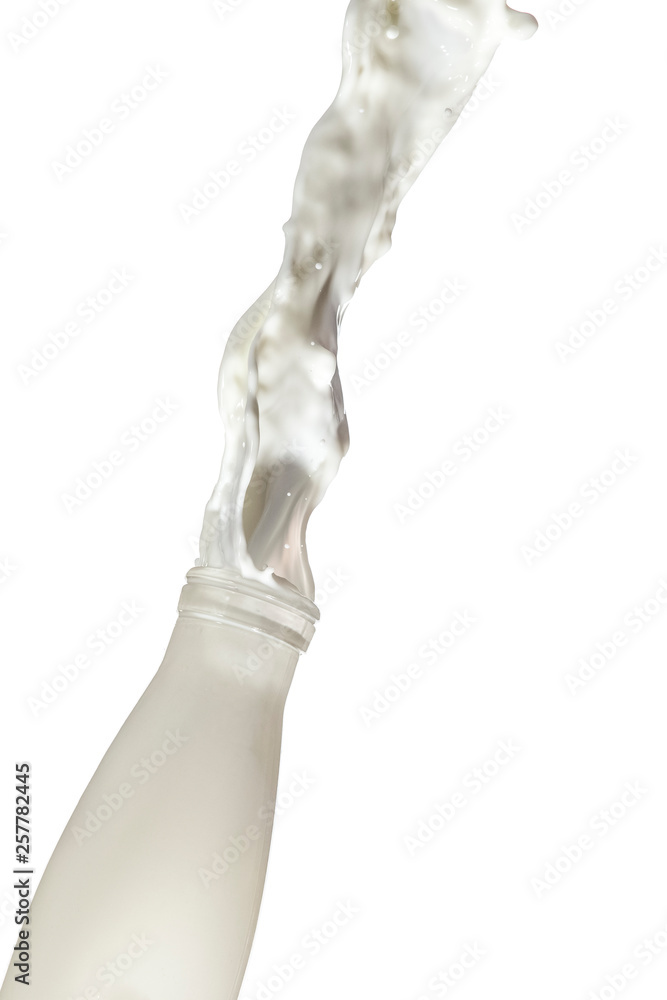 Liquids Photography. Milk Splash Out Of The Bottle. Isolated Over White Background. Liquids Photography. Milk Splash Out Of The Bottle. Isolated Over White Background.