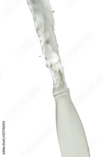 Fast Action Liquids Photography. Milk Splash Out Of The Bottle. Isolated Over White Background