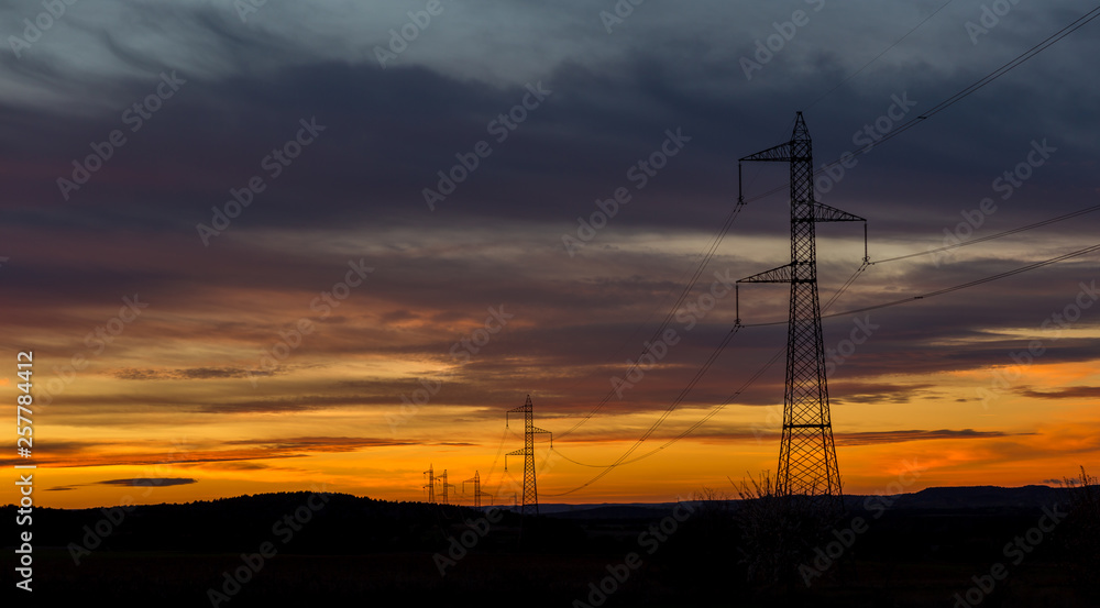 Sunset over the power line