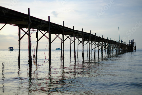 Wooden bridge in the sea © Attapol