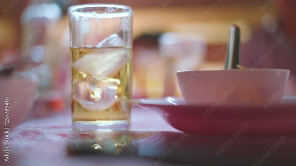 Drinking Thai whiskey mixed with soda water and ice in ceremony or event in Thailand Drinking Thai whiskey mixed with soda water and ice in ceremony or event in Thailand