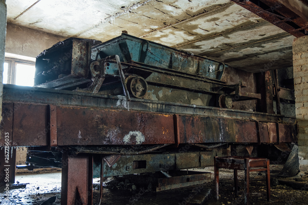 Old rusty trolley in abandoned mining plant