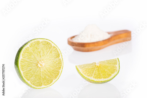 Baking soda (sodium bicarbonate) and lemon - Citrus × latifolia