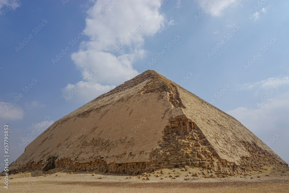 Dahshur, Egypt: The Bent Pyramid, built under the Old Kingdom Pharaoh Sneferu (c. 2600 BC). Dahshur, Egypt: The Bent Pyramid, built under the Old Kingdom Pharaoh Sneferu (c. 2600 BC).