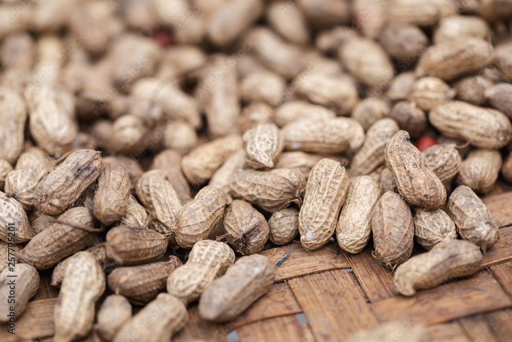 Pile of peanut in shell texture at market for food and agriculture concept design. Pile of peanut in shell texture at market for food and agriculture concept design.