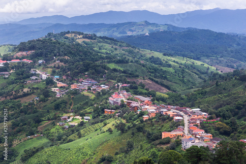 High angle view landscape of Doi Mae Salong mountain with hill tribe village. Doi Mae Salong is in northern part of Chiang Rai province, Thailand.