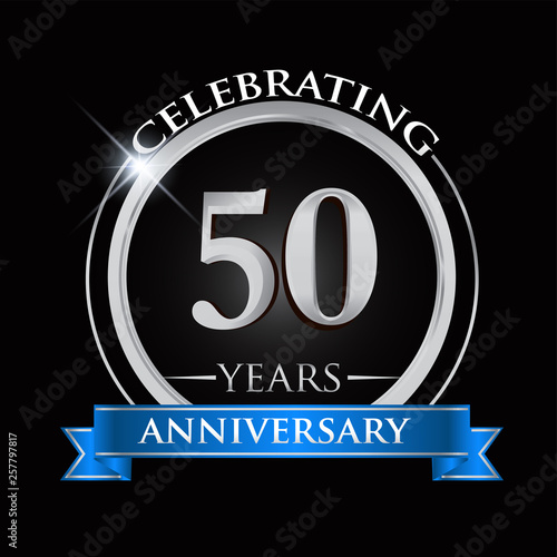 Celebrating 50 years anniversary logo. with silver ring and blue ribbon.