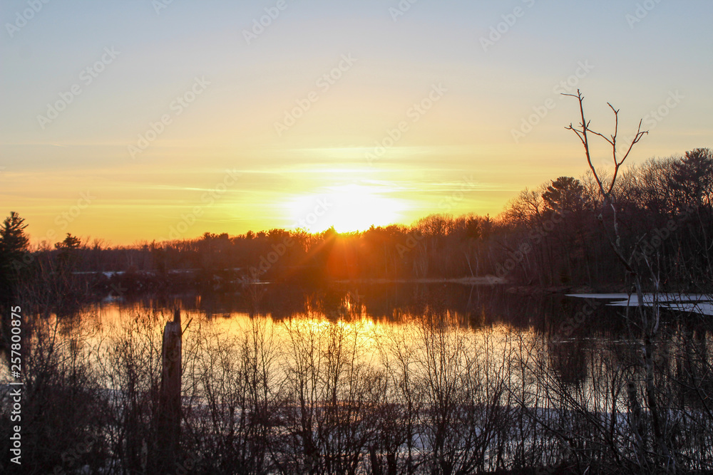Fototapeta premium sunset over a river