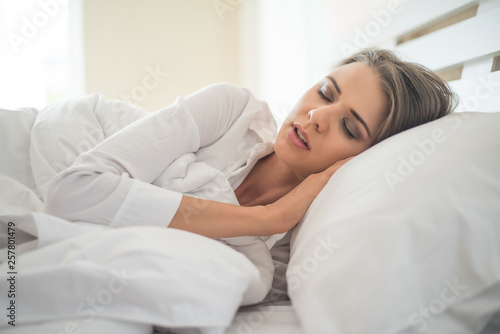 Beautiful Young woman sleeping in bed