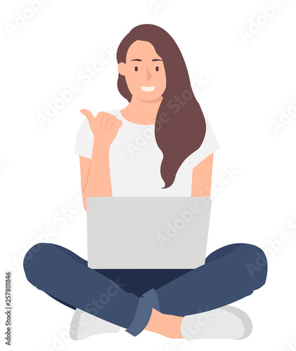 Cartoon people character design woman working on laptop while sitting on the floor with crossed legs and point finger away