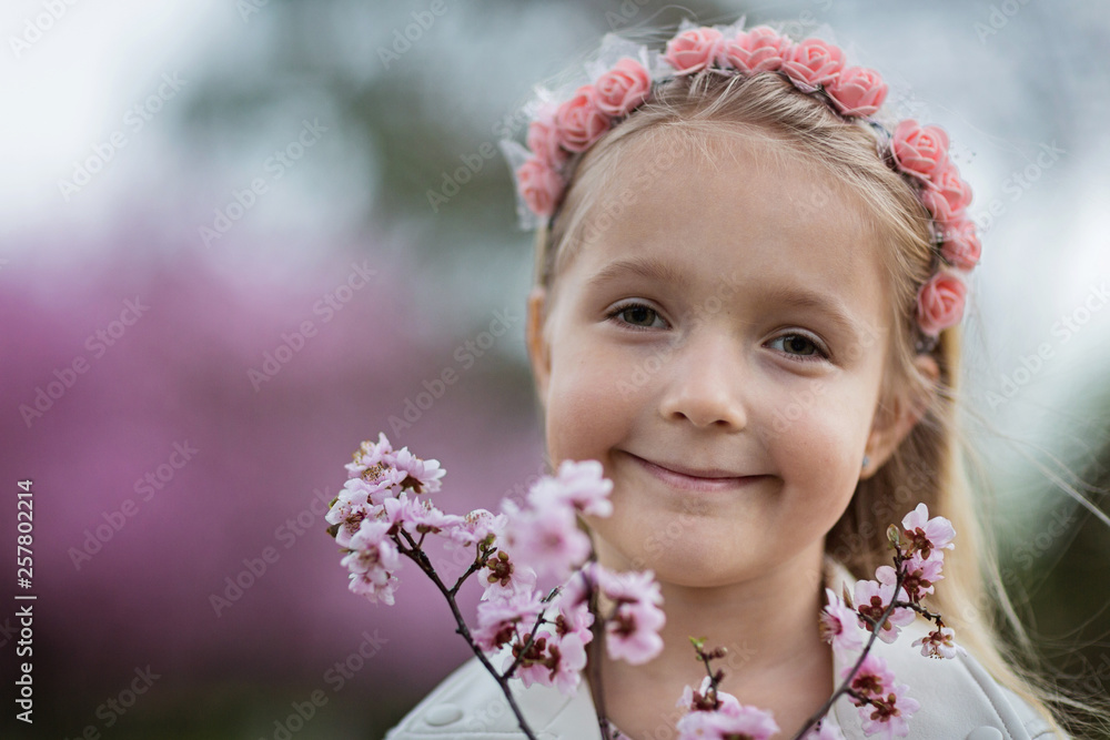Portrait of cute little girl with blonde hair outdoor. Spring season. Portrait of cute little girl with blonde hair outdoor. Spring season.