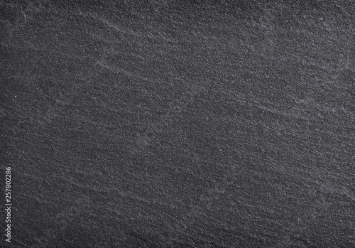 Dark grey black slate background or texture.