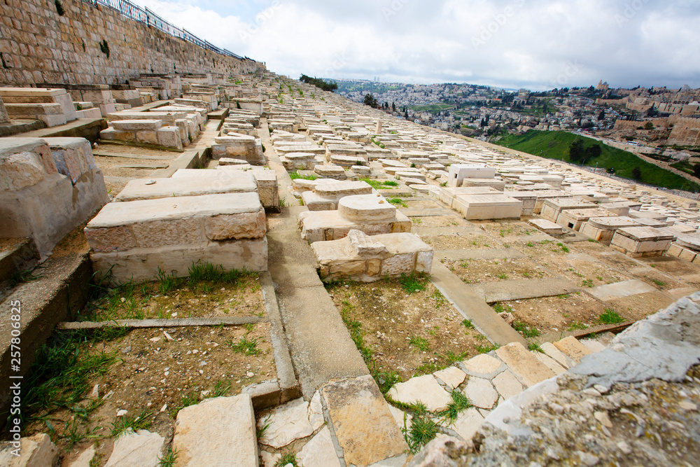 JERUSALEM, ISRAEL - MARCH 25, 2019: View to jewish cemetery and old Jerusalem JERUSALEM, ISRAEL - MARCH 25, 2019: View to jewish cemetery and old Jerusalem