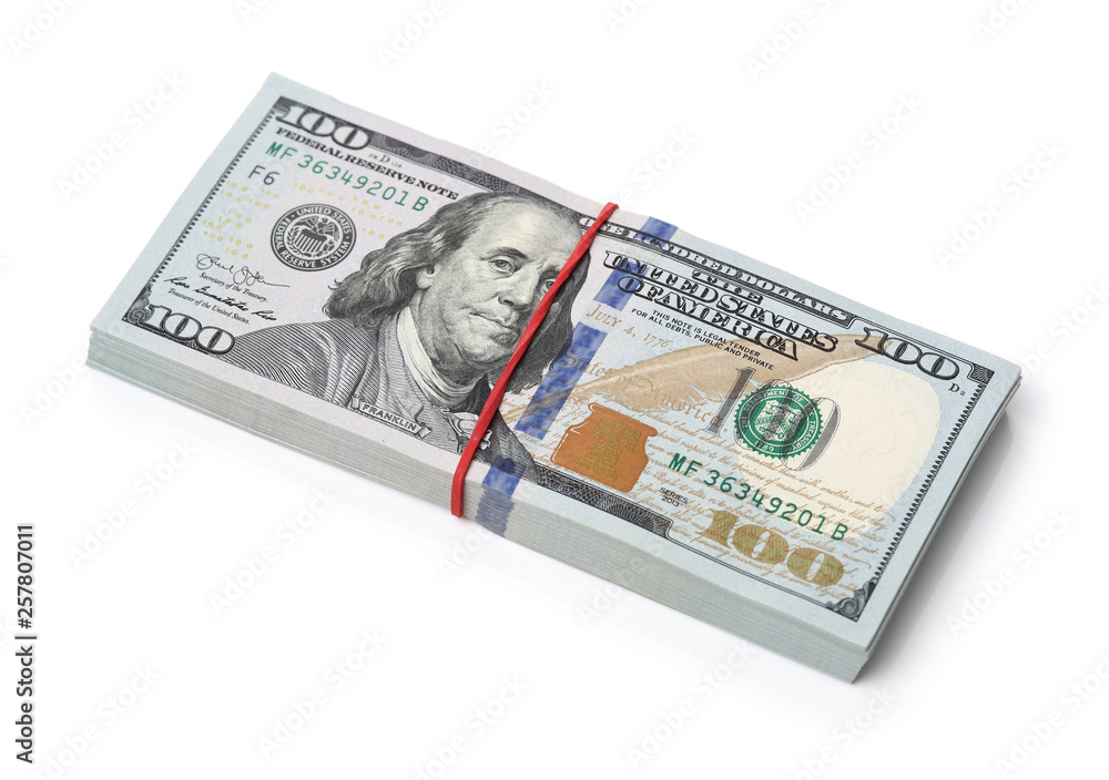 Many bundle of US 100 dollars bank notes isolated on white background Many bundle of US 100 dollars bank notes isolated on white background