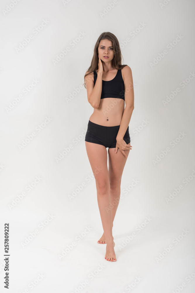 Beautiful woman with healthy body on white background Beautiful woman with healthy body on white background