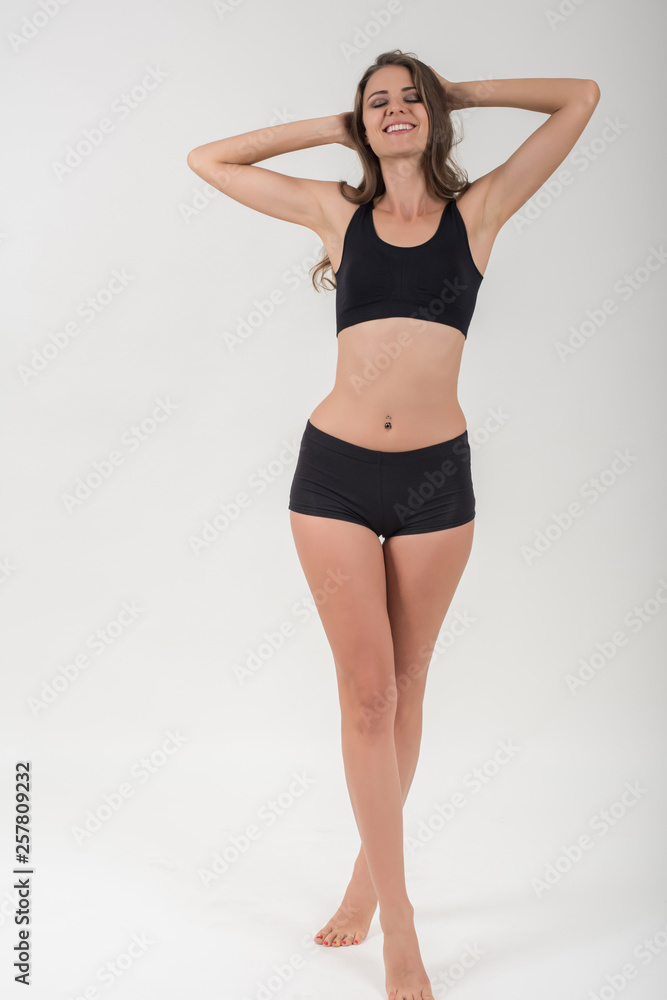 Beautiful woman with healthy body on white background