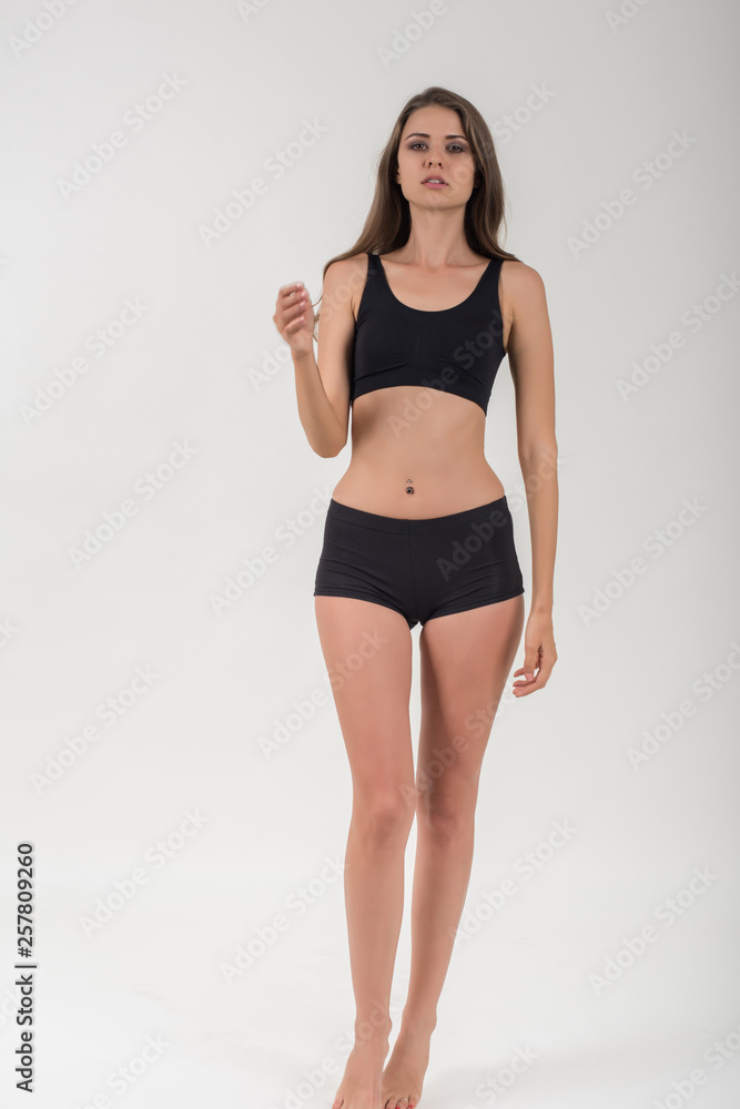 Beautiful woman with healthy body on white background Beautiful woman with healthy body on white background