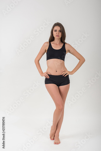 Beautiful woman with healthy body on white background © Johnstocker