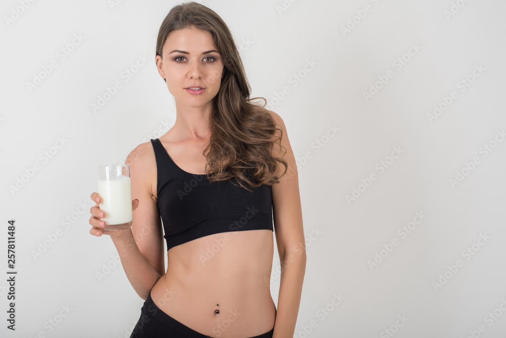 Beautiful young woman with glass milk Beautiful young woman with glass milk