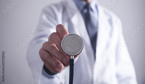 Doctor holding stethoscope. Healthy and Medical concept