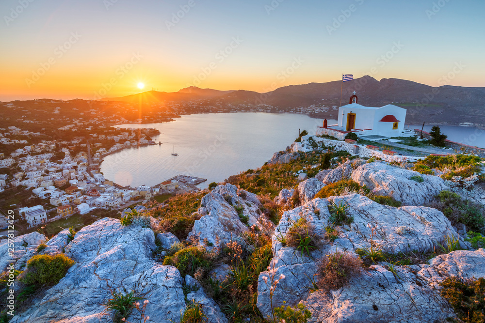 View of Agia Marina village on Leros island in Greece at sunset.
